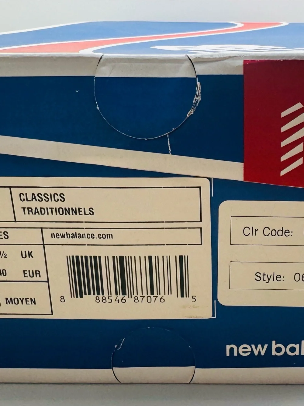New Balance Women’s White Sneakers with Gold Accents